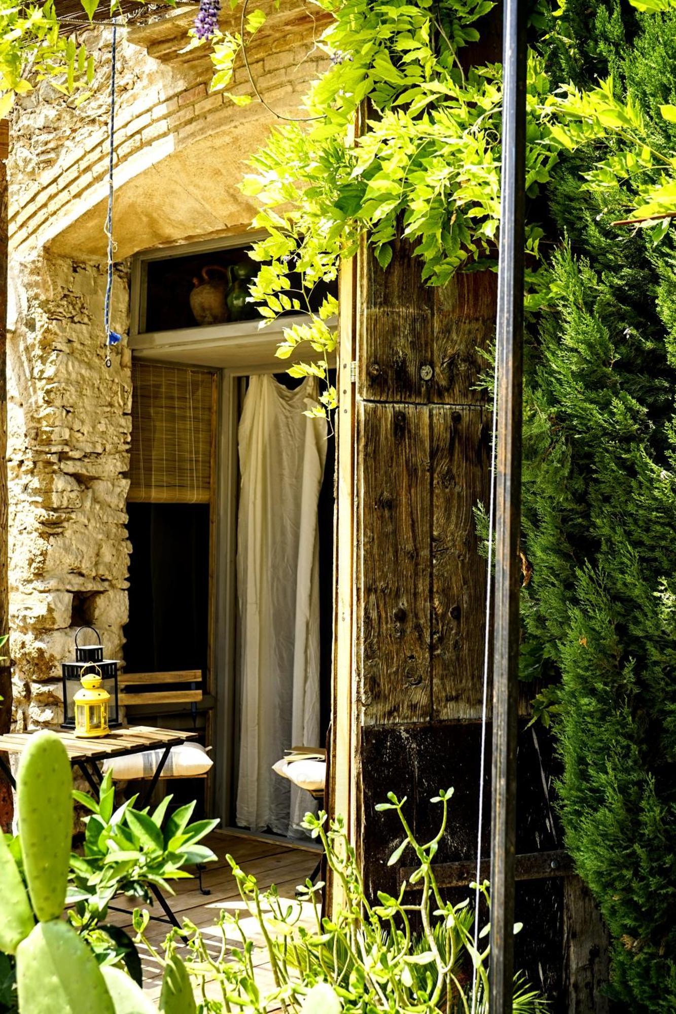 Can Tat, Loft In A Old Coach House Sant Jordi Desvalls Exteriér fotografie